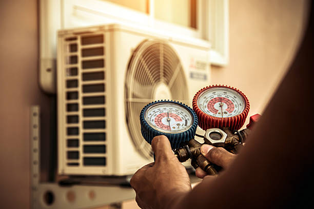 Professional Air Conditioning Service technician working in Pawtucket, RI